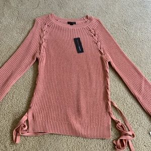 light pink sweater